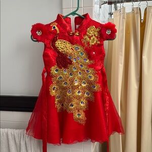 Chinese new year girls Red dress with Peacock